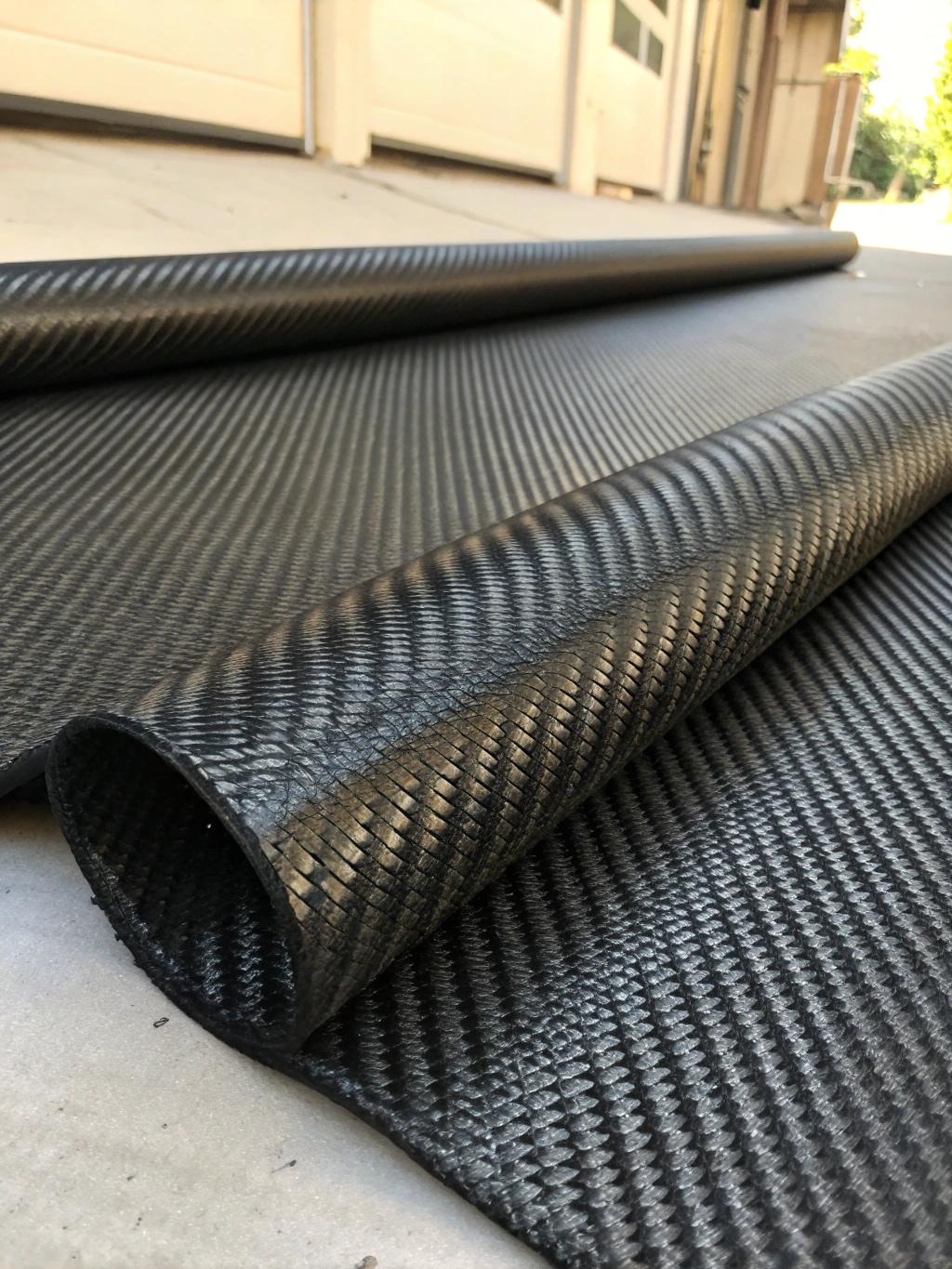 Macro photograph of carbon fiber weave pattern